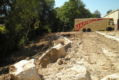 Martell’s of Sutton dumped nearly seven times the permitted amount of waste on the railway cutting. Credit: EA