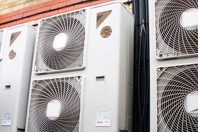 Better office temperature control could boost worker productivity by 14%. Credit: SFL Travel/ Alamy