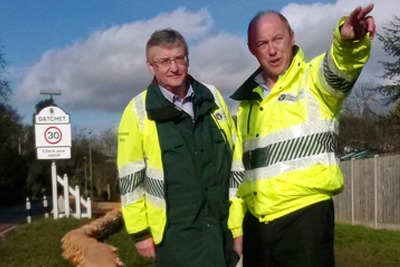 Environment Agency chief executive Paul Leinster with south-east regional director Howard Davidson inspecting the sandbag wall in Datchet (photograph: Environment Agency)