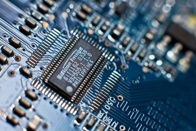 Computer circuit board. Credit: Harland Quarington/MOD, via Wikimedia Commons