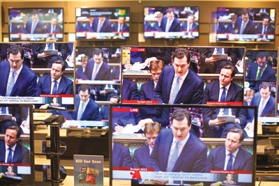 Chancellor George Osbourne delivering the Budget. Credit: Jeff Gilbert/Alamy