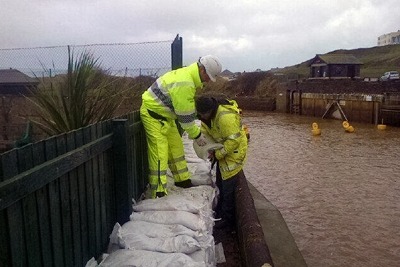 Emergency repairs to flood defences in February, Bude, Cornwall: no 'frontline' jobs will go says the Environment Agency (photograph: Environment Agency)