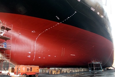 Ship's hull being sprayed with AkzoNobel's Intersleek biocide-free coating