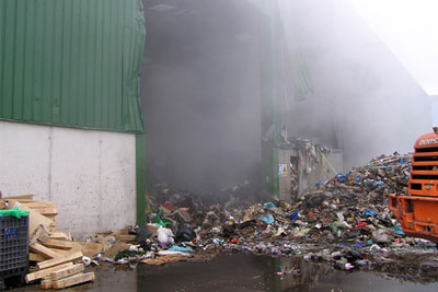 Some of the backlog of waste self-combusted causing a serious fire (photograph: Environment Agency)
