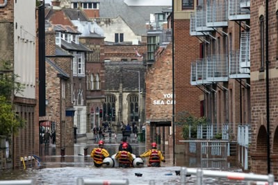 All hands on deck during last winter's floods (photograph: Steve Allen/123RF)