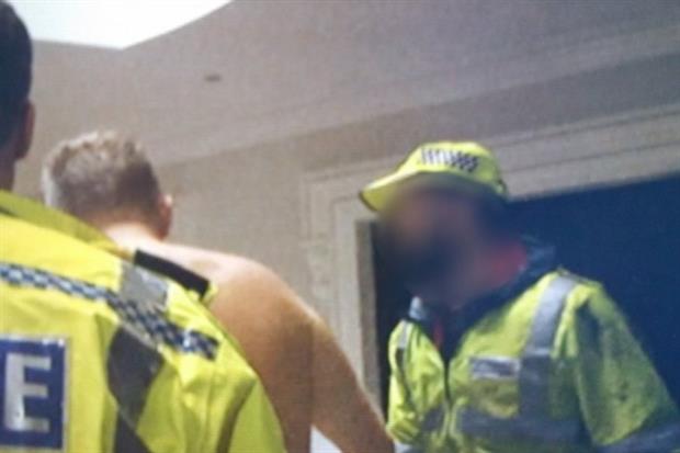 A suspected landfill tax fraudster is arrested at home (photograph: HMRC)