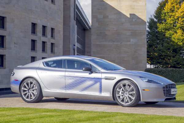 Oliver Letwin hopes to see technology such as Aston Martin's 1000bhp Rapide electric concept car filter down to the mass market in the coming years. Photograph: Aston Martin