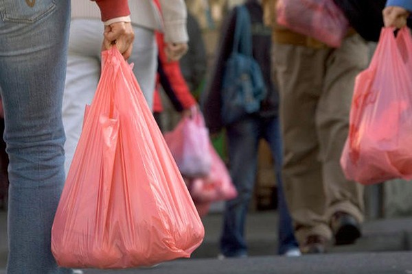 Local trading standards officers are responsible for enforcing plastic bag charges in England. Photograph: Day Donaldson/Flikr