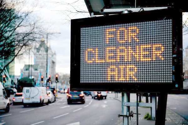 Signs asking drivers to switch off engines when Tower Bridge is raised are part of a raft of new measures to tackle air pollution. Photograph: Greater London Authority