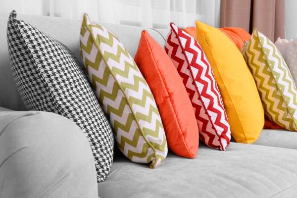 UK rules state that all upholstered furniture, including sofas and scatter cushions, should be match and cigarette resistant. Photograph: Belchonock / 123RF