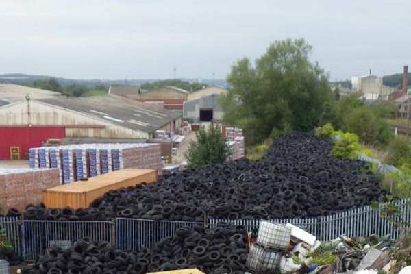 The tyres towered next to the East Coast Main Line railway line. Photograph: Environment Agency
