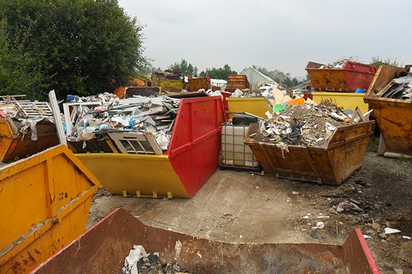 Mohammed Rashid stored more than four times the amount of waste allowed on his Keighley site, as well as overflowing skips by the road outside. Photograph: Environment Agency