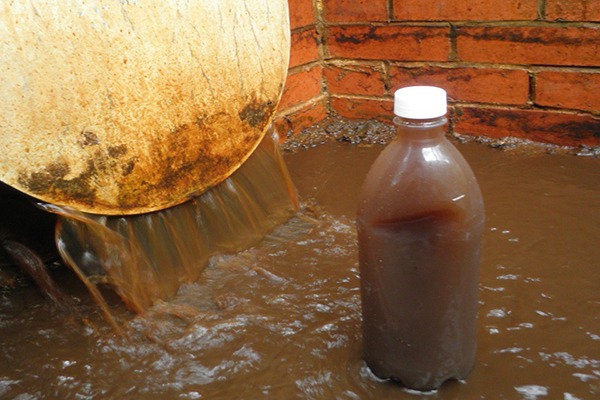 Silt-laden water was discharged into a tributary of the river Rother in Burwash. Photograph: Environment Agency