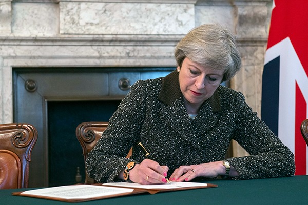 May has been urged not to weaken environmental protections. Photograph: No 10