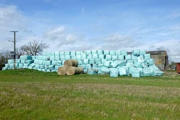 Farmers have been left with bales of landfill waste dumped on their land. Photograph: Environment Agency
