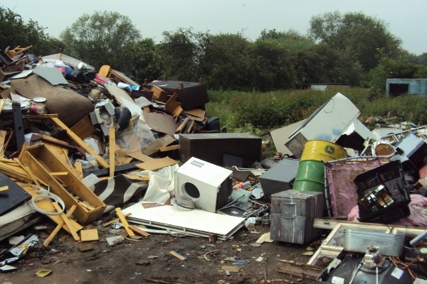 Murphy had used the land to store and burn large quantities of mixed waste including metal, wood, electrical items and construction and demolition waste. Photograph: Environment Agency