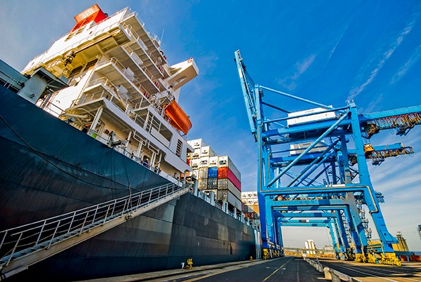 Close up of cargo ship in loading bay. Photograph: Don Victorio/123RF