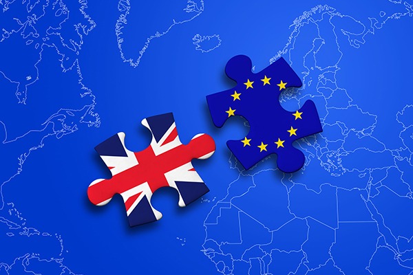 Brexit illustration: one jigsaw piece with EU flag and one with Union Jack. Photograph: Alessandro Bianco/123RF