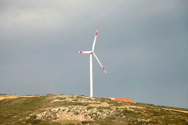 Wind turbine on a hill. Photograph: Şafak Cakır/123RF