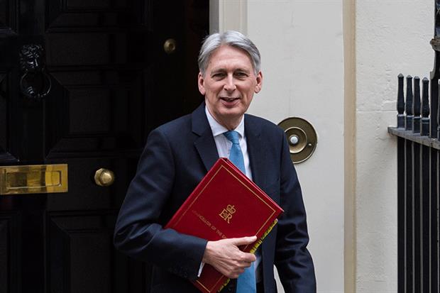 Philip Hammond on his way to delivery the Spring Statement. Photograph: WIktor Szymanowicz/NurPhoto via Getty Images