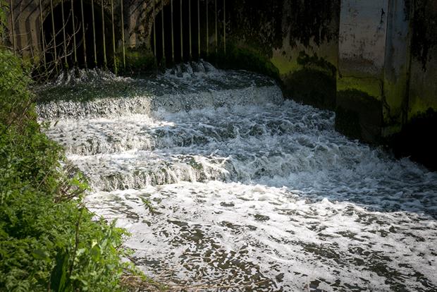 Wastewater discharging from a sewage treatment plant into river