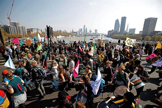 Extinction Rebellion activists blocked several roads in London, including Waterloo Bridge, for almost two weeks in April. Photograph: OLGA AKMEN/AFP via Getty Images