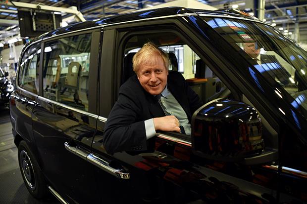 Prime minister Boris Johnson hits the campaign trail with a visit to the LEVC factory in Coventry. Photograph: Ben Stansall/Getty Images