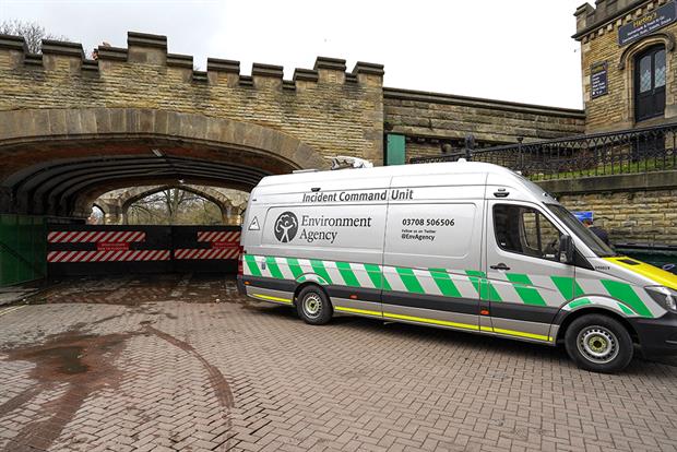 Environment Agency incidence command unit vehicle parked at a bridge