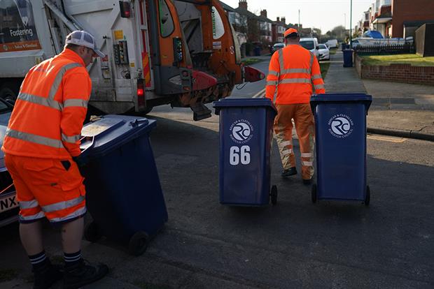 Refuse collection teams continue to work as normal as the UK adjusts to life under the coronavirus pandemic. Photograph: Ian Forsyth/Getty Images