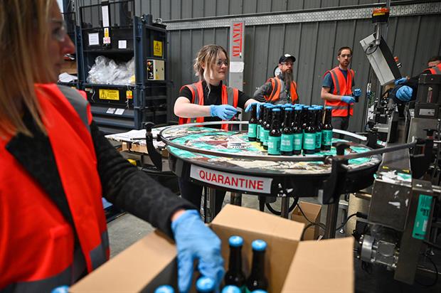 Emergency response: BrewDog brewery pack hand sanitiser being produced at the plant (Photograph: Jeff J Mitchell/Getty Images)