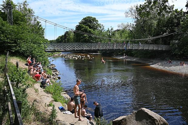 Bathers on the river Wharfe. Photograph: Paul Ellis/Getty Images