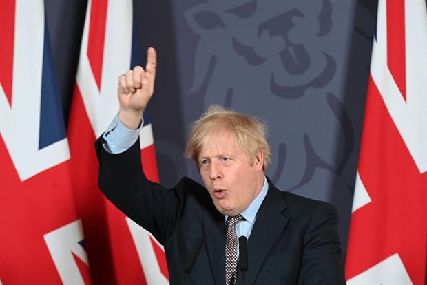 The prime minister Boris Johnson holds a press conference on reaching a Brexit trade deal in Downing Street on 24 December 2020. Photograph: WPA Pool/Getty Images