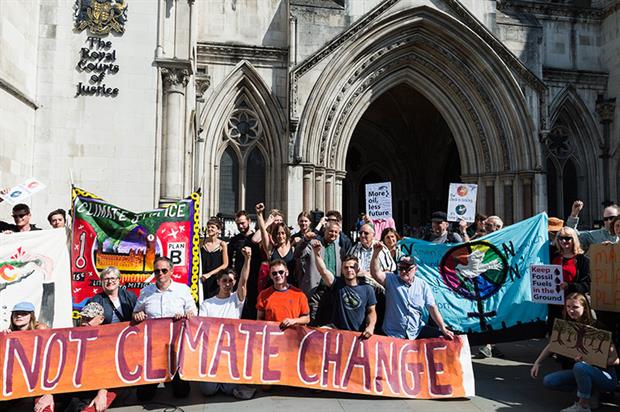 Campaigners outside the Royal Courts of Justice during the judicial review of the government's Heathrow expansion policy. Photograph: Wiktor Szymanowicz/Getty Images