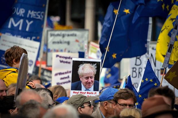 Protesters march through London as MPs debate the government's revised Brexit deal. Photograph: Laura Chiesa/Getty Images