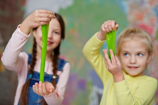 Girls playing with slime