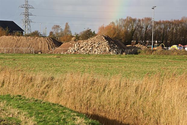 The site, which the EA says could cause a risk to human health, shares a boundary with a football pitch. Photograph: Derek Baxter