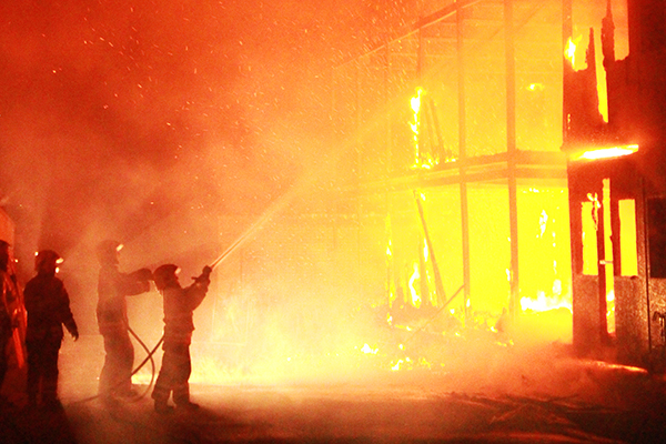 Firefighters battling a fire