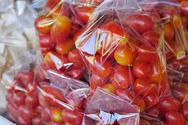 Tomatoes wrapped in plastic