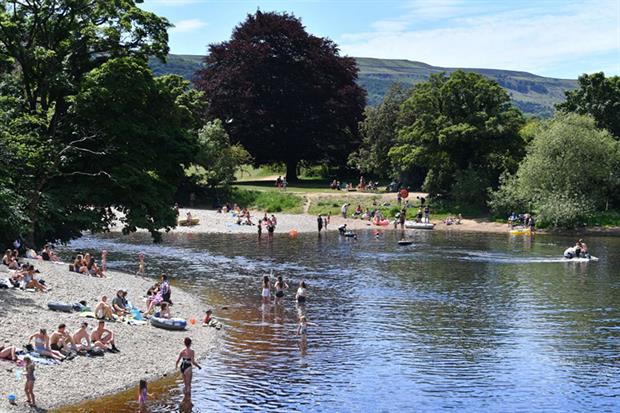A part of Yorkshire’s river Wharfe has been designated a bathing water following a campaign which claimed a 1km stretch popular for swimming is beset by sewage pollution (Photo by PAUL ELLIS/AFP via Getty Images)