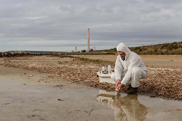 Man taking water sample