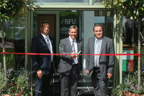 Justin King flanked by AC Goatham partners Ross and Clive Goatham - image:HW