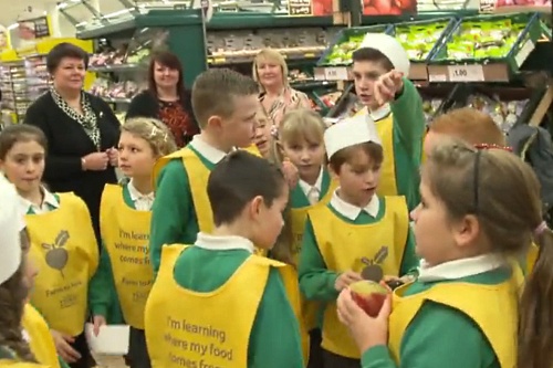 Schoolchildren visit a Tesco fresh produce department - image:Tesco