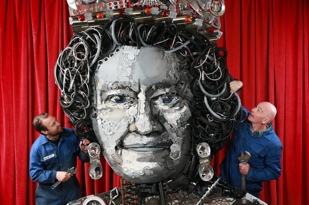 The Queen of Parts sculpture comprises over 800 car and truck parts