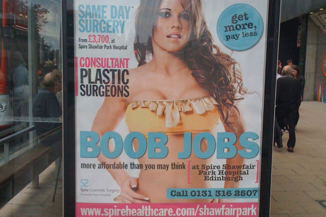 Watchdog bans boob jobs outdoor ad