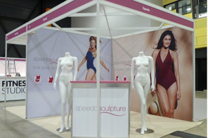 The Speedo Sculpture stand being set up at Glow