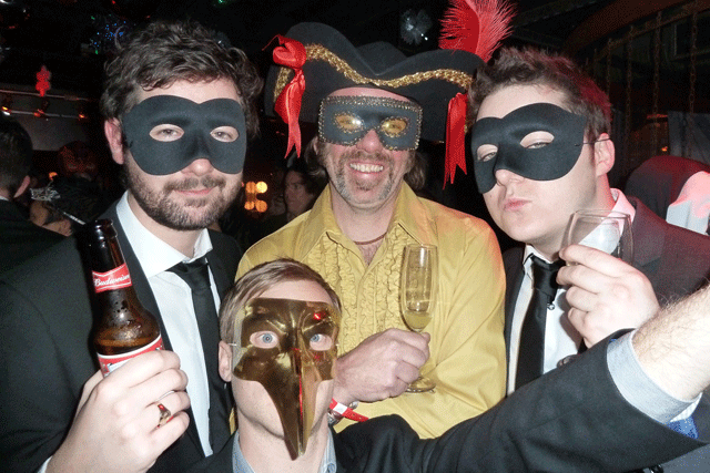 Nude falconry anyone? Dennis Publishing's David Weeks (with feather in cap)