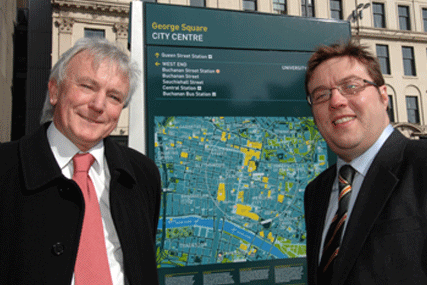Clear Channel Outdoor development director Dave Huckerby (left) and Cllr Steven Purcell, leader of Glasgow City Council, unveil the first of the new tourist information sites