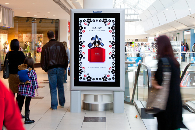 Whether digital or printed, shopping centres are a great place to promote your retail offerings, especially if you have a brick and mortar location near by like this mobile phone advertisement. 