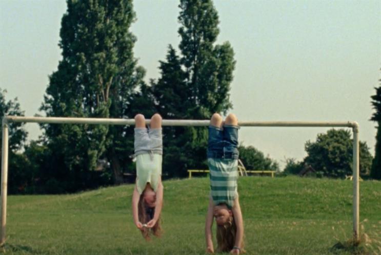 Dairylea: ad features a child eating while hanging upside down from the crossbar of a goal