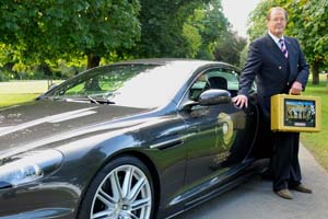 Roger Moore launched the tour of the golden briefcase
